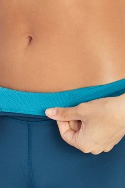 Marika Sport Solid Capri Legging - Teal Nights | High-Performance Workout Capris for Women 8 Marika Sport Solid Capri Legging - Teal Nights